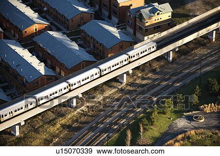 Aerial view of commuter train in Chicago, Illinois View Large Photo Image Stock Photo - Aerial view of commuter train in Chicago, Illinois. Fotosearch