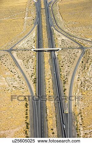 Aerial view of desert highway with overpass View Large Photo Image Stock Photography - Aerial view of desert highway with overpass. Fotosearch