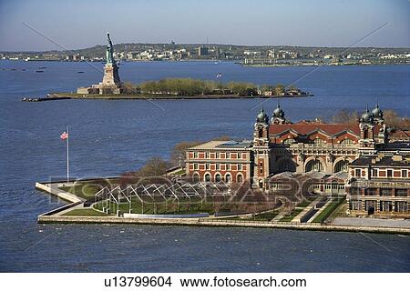 Picture - Aerial view of Ellis Island with Statue of Liberty, New York City. Fotosearch
