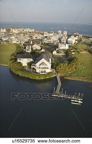Aerial view of houses and ocean at Bald Head Island, North Carolina. View Large Photo Image Stock Photography - Aerial view of houses and ocean at Bald Head Island, North Carolina.. Fotosearch