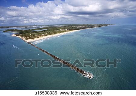 Aerial view of jetty and beach on Fort Pierce, Florida View Large Photo Image Stock Photograph - Aerial view of jetty and beach on Fort Pierce, Florida. Fotosearch