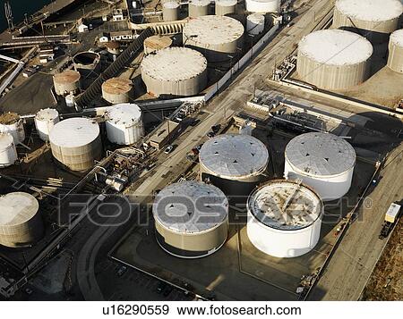 Aerial view of liquid storage tanks in Los Angeles California oil refinery. View Large Photo Image Stock Photo - Aerial view of liquid storage tanks in Los Angeles California oil refinery.. Fotosearch