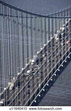 Aerial view of New York City's Verrazano-Narrow's bridge with traffic. View Large Photo Image Stock Image - Aerial view of New York City's Verrazano-Narrow's bridge with traffic.. Fotosearch