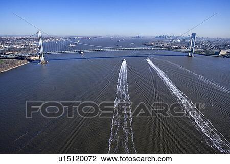Aerial view of New York City's Verrazano-Narrow's Bridge with boats in water. View Large Photo Image Stock Image - Aerial view of New York City's Verrazano-Narrow's Bridge with boats in water.. Fotosearch