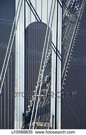 Stock Photography - Aerial view of New York City's Verrazano-Narrow's bridge with traffic.. Fotosearch
