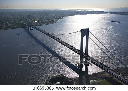 Aerial view of New York City's Verrazano-Narrow's bridge with ship. View Large Photo Image Stock Photography - Aerial view of New York City's Verrazano-Narrow's bridge with ship.. Fotosearch