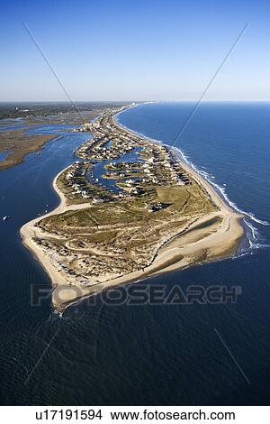 Picture - Aerial view of peninsula with beach and buildings in Murrells Inlet, South Carolina.. Fotosearch
