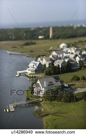 Aerial view of residential area with docks on Bald Head Island, North Carolina View Large Photo Image Stock Photo - Aerial view of residential area with docks on Bald Head Island, North Carolina . Fotosearch