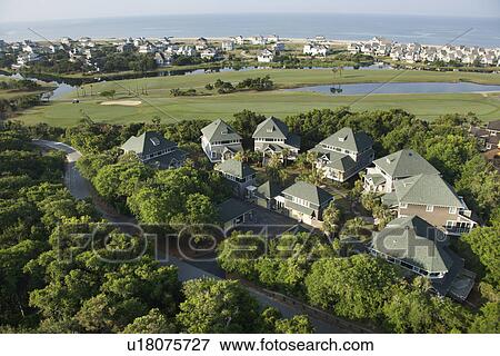 Aerial view of residential community on Bald Head Island, North Carolina View Large Photo Image Stock Photo - Aerial view of residential community on Bald Head Island, North Carolina . Fotosearch