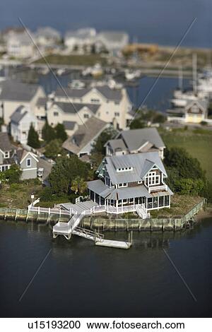 Stock Image - Aerial view of residential community and docks on Bald Head Island, North Carolina.. Fotosearch