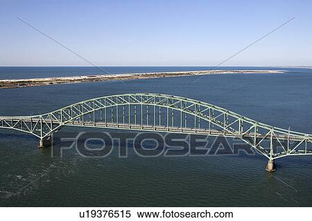 Stock Photography - Aerial view of Robert Moses Causeway bridge in New York.. Fotosearch
