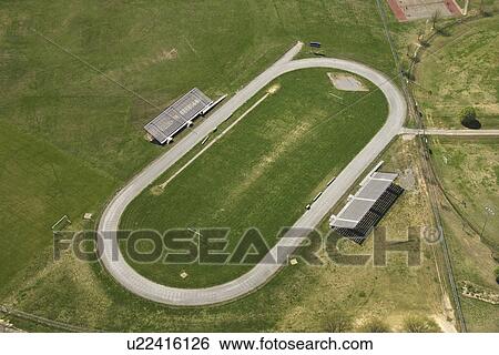 Aerial view of running track with bleachers. View Large Photo Image Stock Photograph - Aerial view of running track with bleachers.. Fotosearch