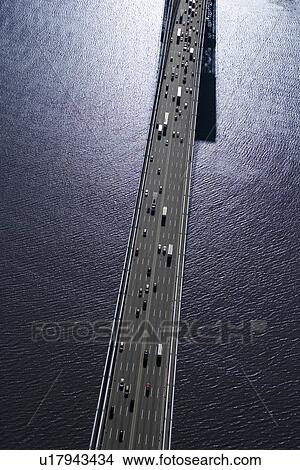 Aerial view of Triborough Bridge over East River in New York City View Large Photo Image Picture - Aerial view of Triborough Bridge over East River in New York City. Fotosearch