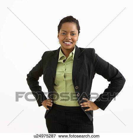 Stock Photo - Businesswoman with hands on hips. Fotosearch