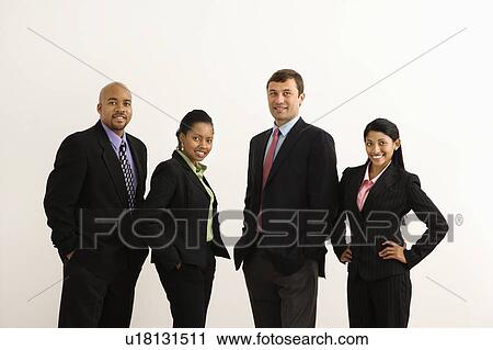 Portrait of businessmen and businesswomen standing smiling against white background. View Large Photo Image Stock Image - Portrait of businessmen and businesswomen standing smiling against white background.. Fotosearch