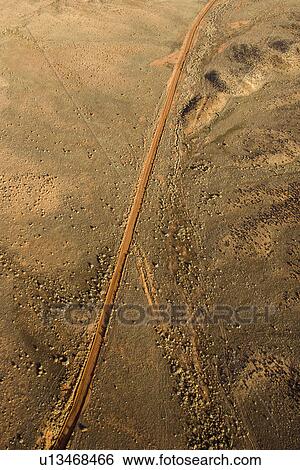 Aerial landscape of rural dirt road in Utah, United States View Large Photo Image Stock Photograph - Aerial landscape of rural dirt road in Utah, United States. Fotosearch