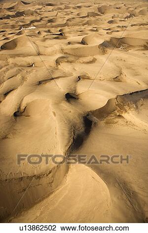 Aerial landscape of sand dunes in Great Sand Dunes National Park, Colorado View Large Photo Image Stock Image - Aerial landscape of sand dunes in Great Sand Dunes National Park, Colorado. Fotosearch