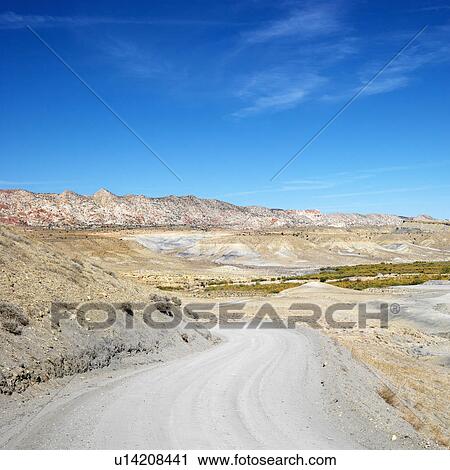 Gravel road in desert land of Cottonwood Canyon, Utah. View Large Photo Image Stock Image - Gravel road in desert land of Cottonwood Canyon, Utah.. Fotosearch
