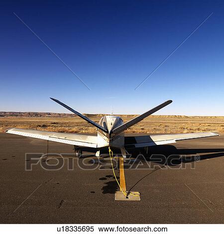 Plane parked on tarmac at Canyonlands Field Airport, Utah, United States View Large Photo Image Stock Photography - Plane parked on tarmac at Canyonlands Field Airport, Utah, United States. Fotosearch