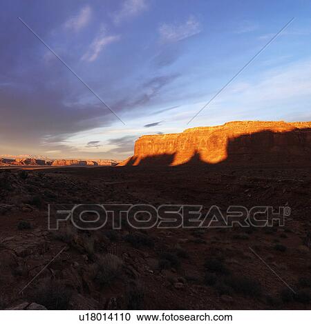 Scenic landscape of mesas in Monument Valley near the border of Arizona and Utah, United States. View Large Photo Image Stock Image - Scenic landscape of mesas in Monument Valley near the border of Arizona and Utah, United States.. Fotosearch