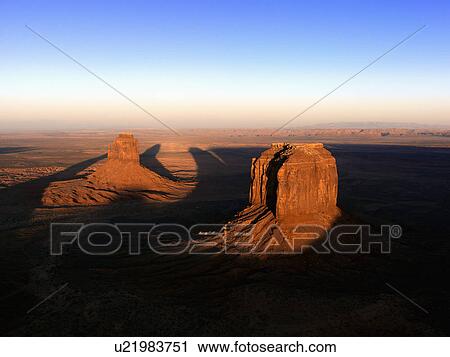 Scenic landscape of mesas in Monument Valley near the border of Arizona and Utah, United States. View Large Photo Image Stock Image - Scenic landscape of mesas in Monument Valley near the border of Arizona and Utah, United States.. Fotosearch