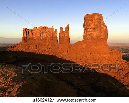 Scenic landscape of mesas in Monument Valley near the border of Arizona and Utah, United States. View Large Photo Image Stock Photo - Scenic landscape of mesas in Monument Valley near the border of Arizona and Utah, United States.. Fotosearch