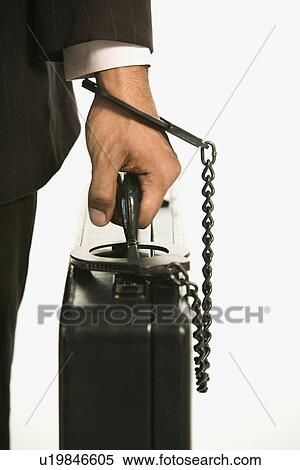 African American businessman in suit handcuffed to briefcase. View Large Photo Image Stock Photography - African American businessman in suit handcuffed to briefcase.. Fotosearch