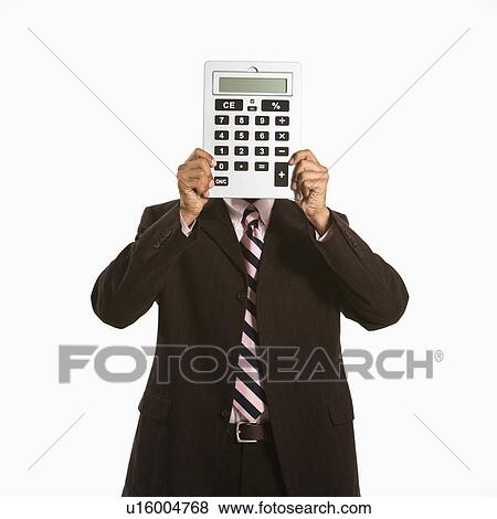Stock Photo - African American man holding oversized calculator over his face.. Fotosearch
