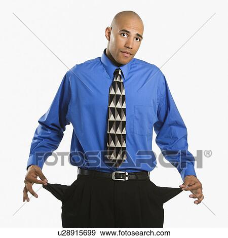 African American man in suit pulling out empty pockets. View Large Photo Image Stock Photo - African American man in suit pulling out empty pockets.. Fotosearch