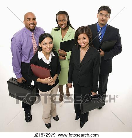 Portrait of multi-ethnic business group standing holding briefcases and looking at viewer. View Large Photo Image Stock Photo - Portrait of multi-ethnic business group standing holding briefcases and looking at viewer.. Fotosearch