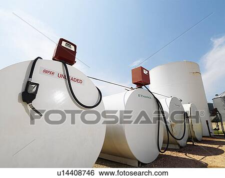 Fuel tanks labeled unleaded and ethanol and pumps View Large Photo Image Stock Photograph - Fuel tanks labeled unleaded and ethanol and pumps. Fotosearch