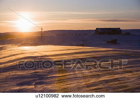 Stock Image - Ice covered road and snowy rural landscape. Fotosearch