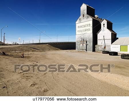 Feed storage building in rural setting View Large Photo Image Stock Photograph - Feed storage building in rural setting. Fotosearch