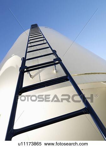 Low angle view of metal grain storage silo with ladder assending to top. View Large Photo Image Stock Photography - Low angle view of metal grain storage silo with ladder assending to top.. Fotosearch