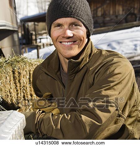 Man outdoors in rural setting smiling View Large Photo Image Stock Photo - Man outdoors in rural setting smiling . Fotosearch