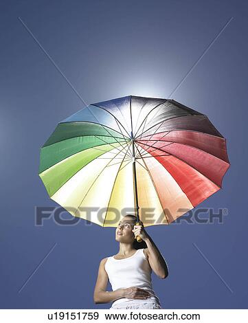 Girl with sun parasol View Large Photo Image Stock Photo - Girl with sun parasol. Fotosearch