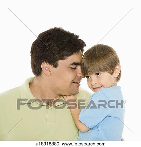 Close up portrait of father holding son against white background View Large Photo Image Stock Image - Close up portrait of father holding son against white background. Fotosearch