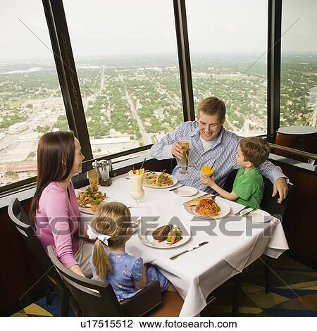Family having dinner together at Tower of Americas restaurant in San Antonio, Texas View Large Photo Image Stock Image - Family having dinner together at Tower of Americas restaurant in San Antonio, Texas. Fotosearch