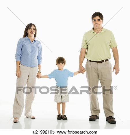 Stock Photography - Family of three standing holding hands. Fotosearch