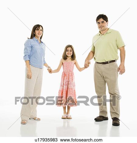 Stock Image - Parents and daughter holding hands . Fotosearch
