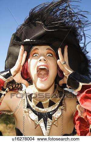 Picture - Close up of young adult Caucasian female dressed in pirate costume.. Fotosearch