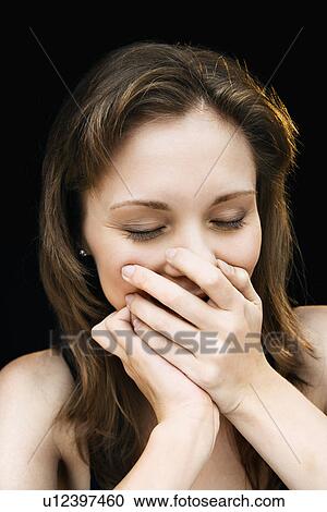 Stock Image - Female laughing. Fotosearch