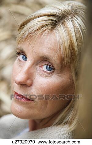 Head shot of middle-aged Caucasian woman. View Large Photo Image Stock Image - Head shot of middle-aged Caucasian woman.. Fotosearch