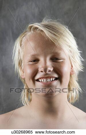 Stock Photography - Male Caucasian adolescent portrait smiling.. Fotosearch