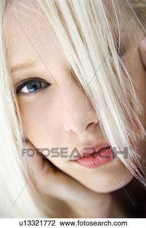 Stock Image - Woman looking at viewer. Fotosearch