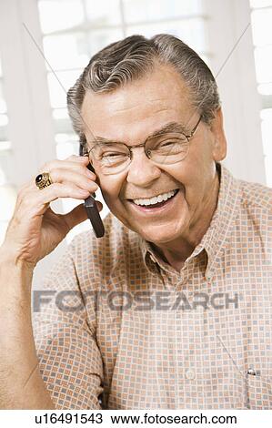 Senior man talking on cellphone View Large Photo Image Stock Image - Senior man talking on cellphone. Fotosearch