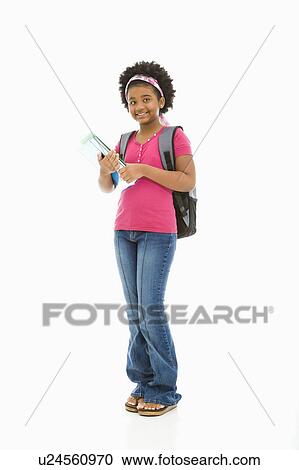 African American girl holding books and wearing backpack smiling at viewer. View Large Photo Image Stock Image - African American girl holding books and wearing backpack smiling at viewer.. Fotosearch
