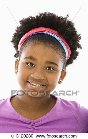 Girl wearing headband smiling at viewer View Large Photo Image Stock Image - Girl wearing headband smiling at viewer. Fotosearch