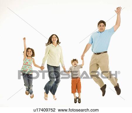 Stock Image - Family jumping and smiling while holding hands.. Fotosearch