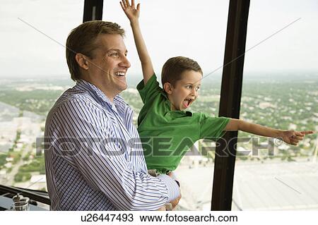 Father and son at observation deck at Tower of the Americas in San Antonio, Texas View Large Photo Image Stock Image - Father and son at observation deck at Tower of the Americas in San Antonio, Texas. Fotosearch